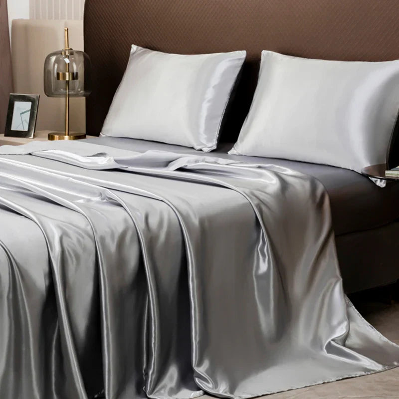 Parure de lit satinée unie – Luxe opulent pour une chambre royale